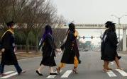 Excited, soon-to-be-graduates make their way to Chartway Arena. Photo Chuck Thomas/ODU