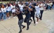 The brothers of Alpha Phi Alpha, Inc., take their turn step dancing on Kaufman Mall. Photo Chuck Thomas/ODU